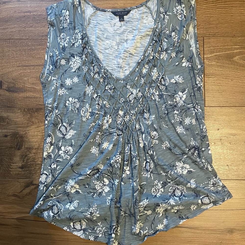 Lucky brand floral top with criss cross fabric detail at neckline